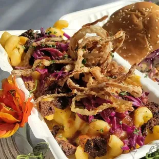 Chill P&apos;s loaded Mac N Cheese Butternut squash mac and cheese loaded with fried onions red cabbage and a drizzle of BBQ sauce