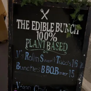 a sign for a plant based restaurant