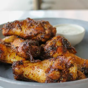 a plate of chicken wings