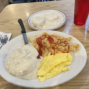 Chicken Fried Steak, 2 scrambled eggs, hash browns &amp; last but not least, a biscuit &amp; gravy!!! GET IT!!!