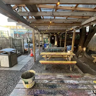 a wooden table with a bucket on it