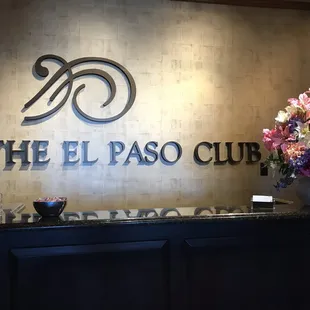 the front desk of the hotel