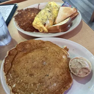 two plates of breakfast food
