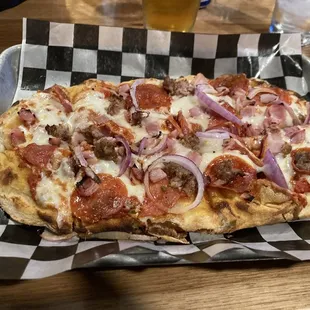 Roman meat lovers style pizza