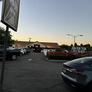 Outside- modest parking lot