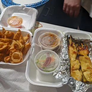 Crab rangoon and chicken satay-fire!