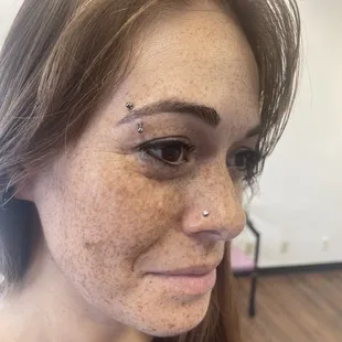 Eyebrow and nostril by Des