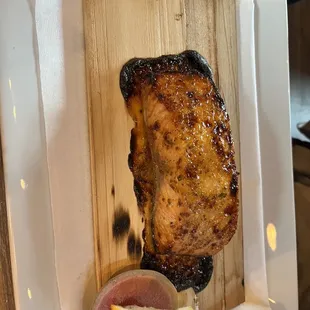 a piece of meat on a cutting board