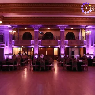 Elks Tower Sacramento Purple Uplighting with Custom Monogram | Brighten Up Event Lighting |  brightenupeventlighting.com