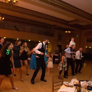 Everyone dancing! We used the center of the room as the dance floor with 6 tables on each side of the room.