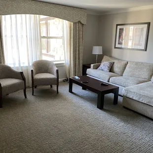 Living area of queen parlor, room 415.  Pool view