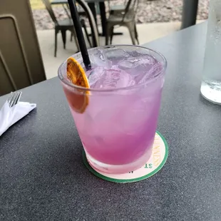 a purple drink on a table