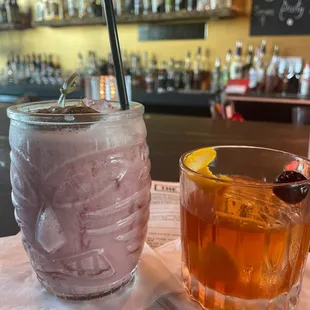 Old fashion and one of their tropical drinks