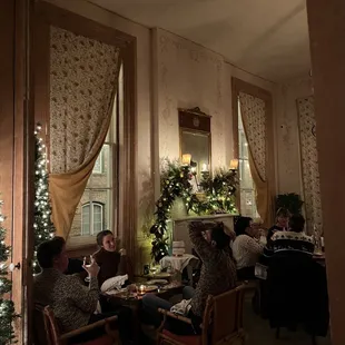 a group of people sitting at a table