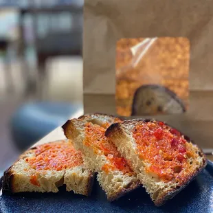 Blistered Country Bread w/ calabrian chile, butter, citrus | $8