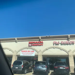 cars parked in front of the store