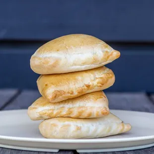 a stack of empanadas