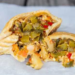 a close up of a vegetable empanada
