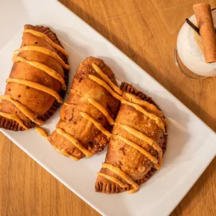 three pastries on a plate