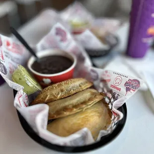 4-cheese empanada, spinach and cheese empanada, cinnamon apple empanada