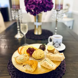 High Tea - to go during social distancing. 4 tea sandwiches, scone, fruit, mini cupcake, chocolate covered strawberry and fresh tea!