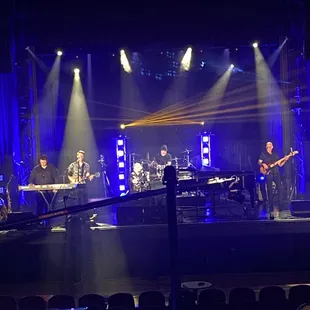 a band performing on stage