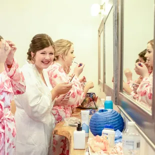 Long makeup bar in bridal suite and lighted mirrors