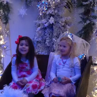 Princess Addison taking pictures with her friends in the Elsa "Frozen" room. What better way to start a birthday!!