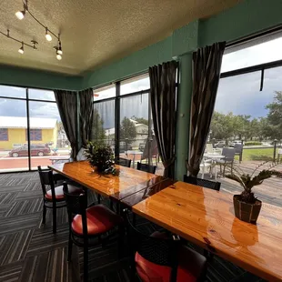 a view of a tennis court through the windows