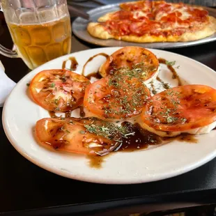  a plate of tomatoes and onions