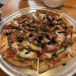 Meat lovers pizza with olives