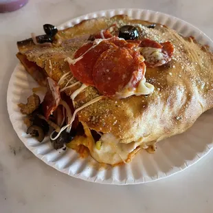 Half of the large calzone