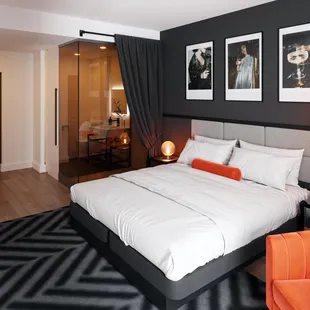 Relax in the comfort of our artfully designed guest rooms with floor to ceiling windows and unique touches like our signature cocktail cart