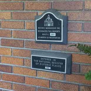 Historical plaque on the exterior of the main house