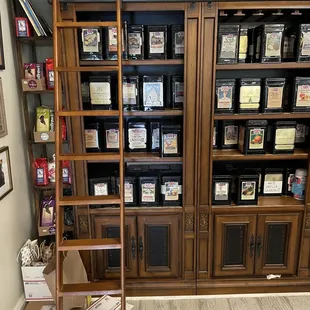 a ladder in front of a bookshelf