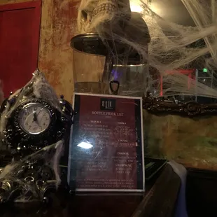 a skull and a clock on a table