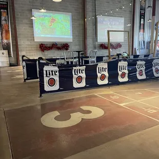 Courts, beer pong, and cornhole area.