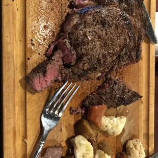 a steak on a cutting board