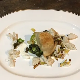 Dungeness crab with potato pierogi and Brussel sprouts.
