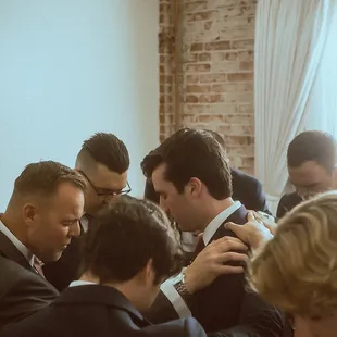 Praying over the groom before he sees his bride   @amandaandnico Www.AmandaandNico.com Instagram.com/amandaandnico