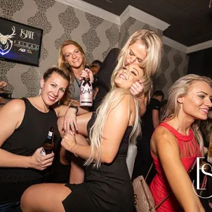 a group of women having fun at a party