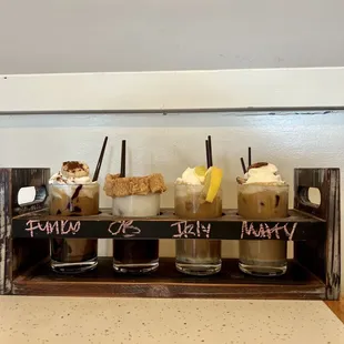 Summer Coffee Flight: Funky Monkey Latte, Cinnamon Toast Crunch Cold Brew, Dreaming of Italy, Nutty Summer Latte.