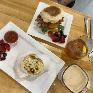BLT plus e with an iced tea and black bean breakfast burrito with an almond milk and caramel flavored latte