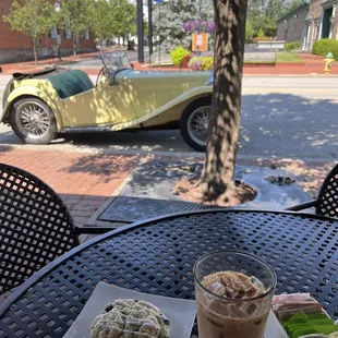 Iced vanilla latte paired with a blueberry scone