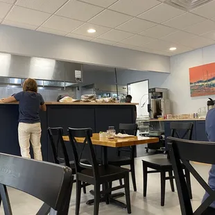 Lots of space between tables - those cooking wearing masks