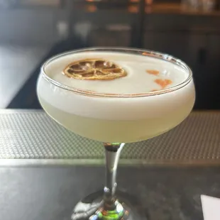 a cocktail in a coupe glass