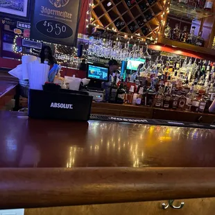 a bar with a wooden bar top
