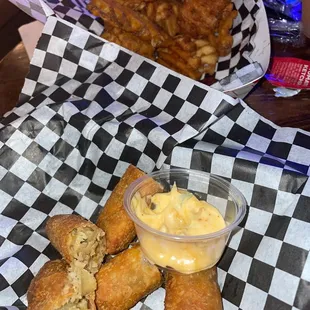Boudin egg rolls &amp; waffle fries.