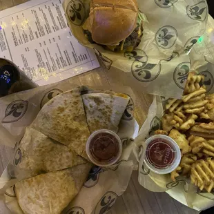 Steak quesadilla and a burger and waffle fries