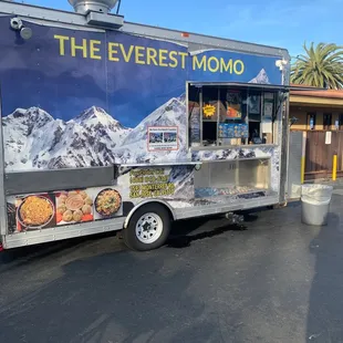 a food truck parked in a parking lot